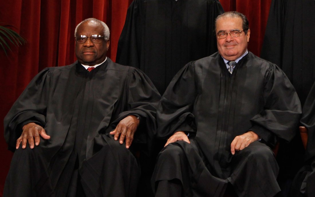 Supreme Court Justices Clarence Thomas and Antonin Scalia.