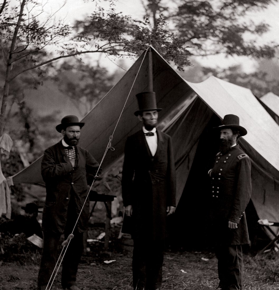 Abraham Lincoln visits a battlefield during the Civil War.