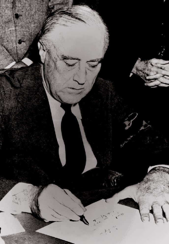 President Franklin D. Roosevelt signing the Declaration of War against Japan on December 8, 1941. Courtesy of the National Archives.